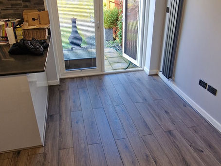 Ripped out old damaged vinyl flooring and layed new waterproof laminate flooring. Happy customers 🥰