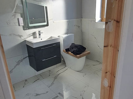 1 of 4 bathroom tiling job done