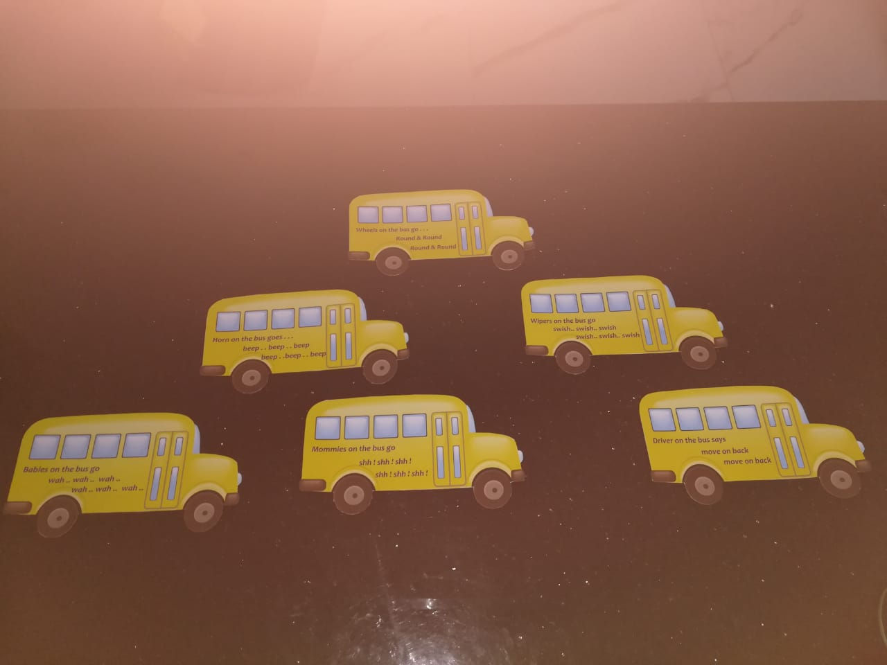 Small buses with wheels on the bus wordings