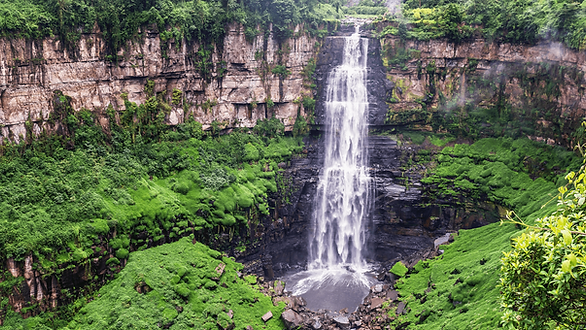 La Chorrera waterfall surrounded by lush green cliffs near Bogotá, Colombia.