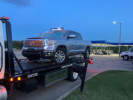 Towing grey truck from Raceway.jpg