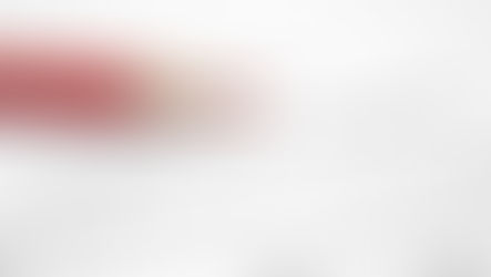 Close-up of a confidentiality agreement document with a red pencil resting on top.