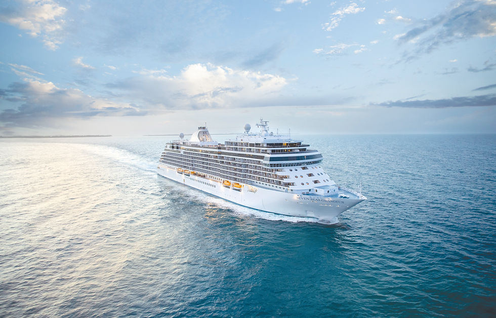 a white ship on pale blue ocean water