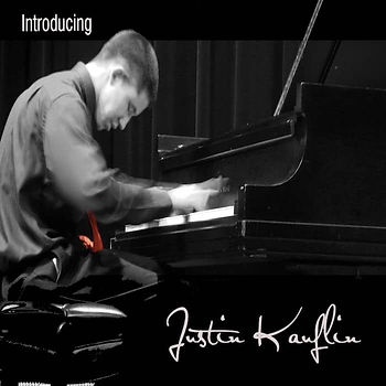 Justin Kauflin at the piano, hands blurred