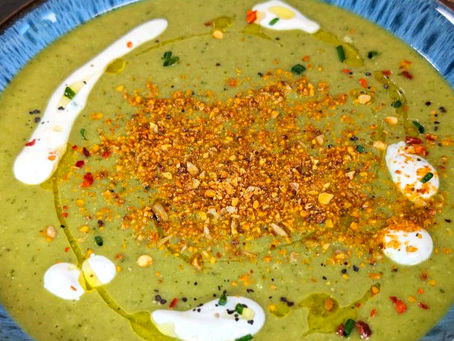 Vibrant green super greens soup topped with Woodland Magic CRUMS
