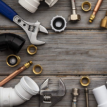 plumbing-tools-pipe-and-fixings-on-rustic-wooden-background-home-improvement-scaled_edited