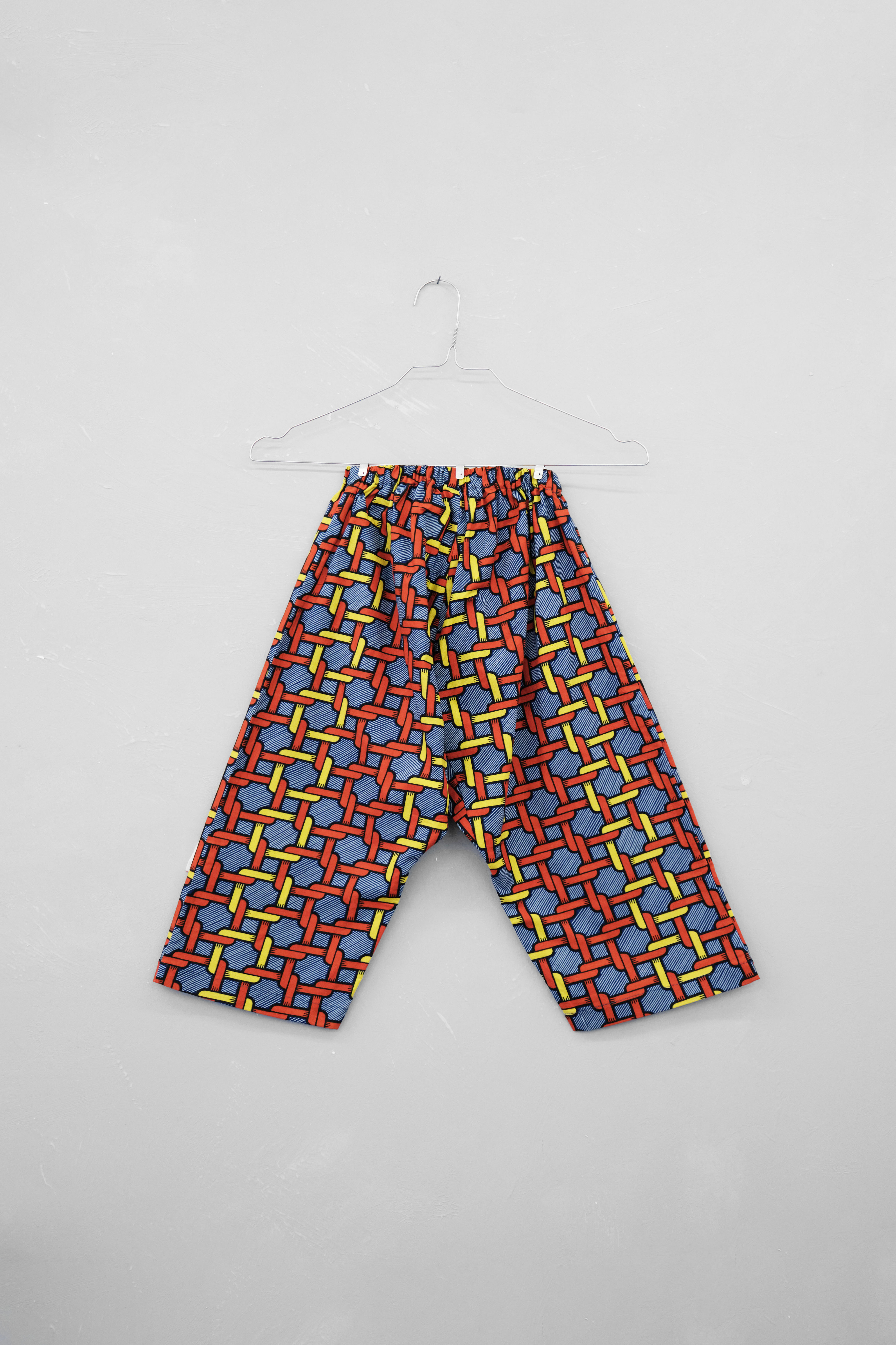 Pantalon en wax orange et jaune vue de face