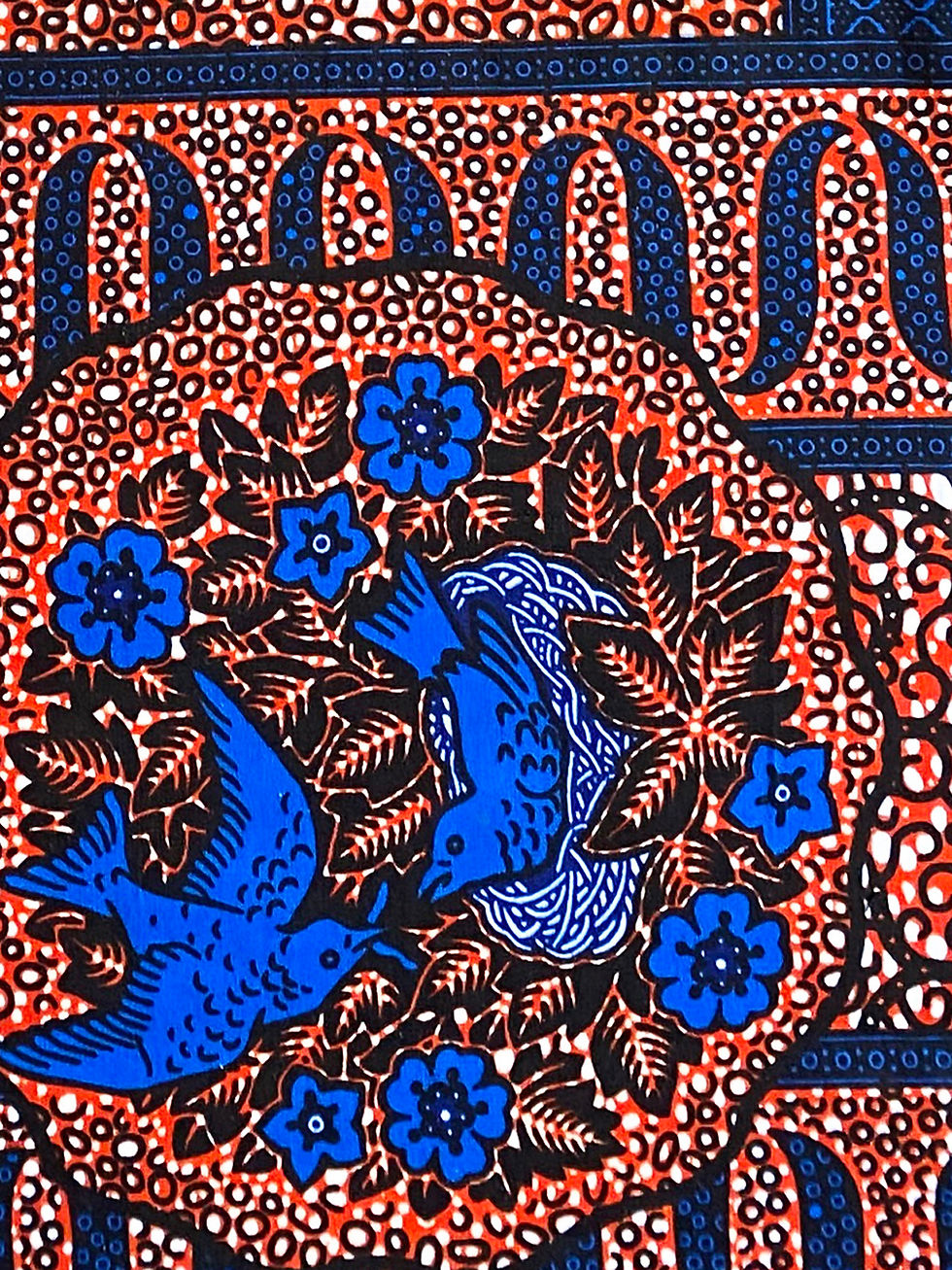 Thumbnail: Détail nappe en wax rouge et bleu