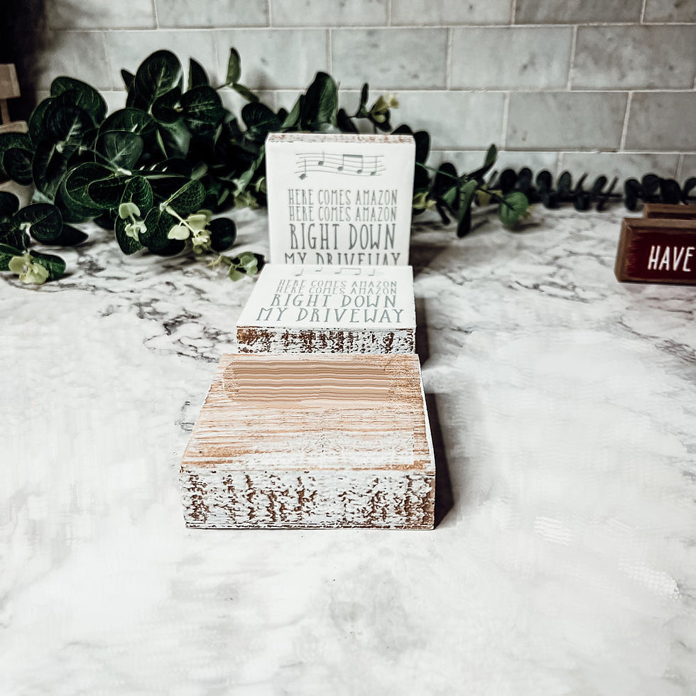 Thumbnail: Square wooden sign with “Here Comes Amazon” text – funny neutral-toned decor for online shoppers
