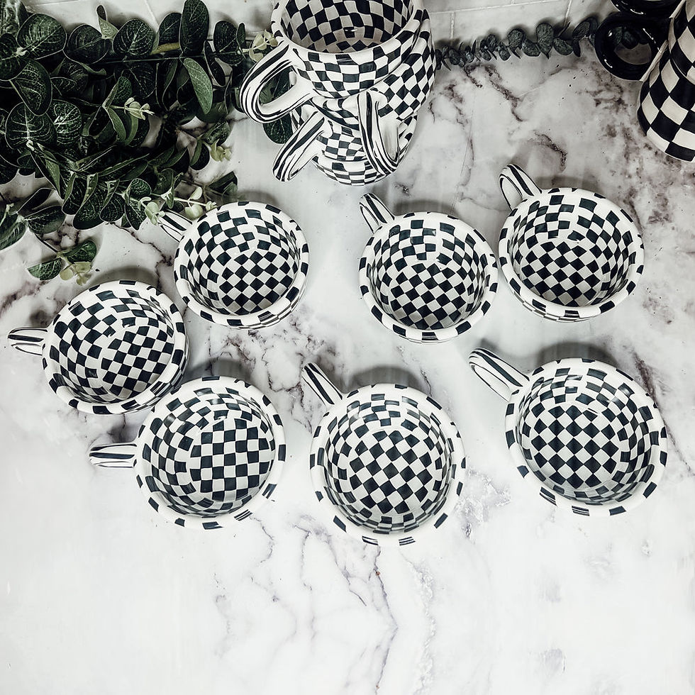 Thumbnail: Small black and white checkered mug with a classic plaid pattern and modern design.