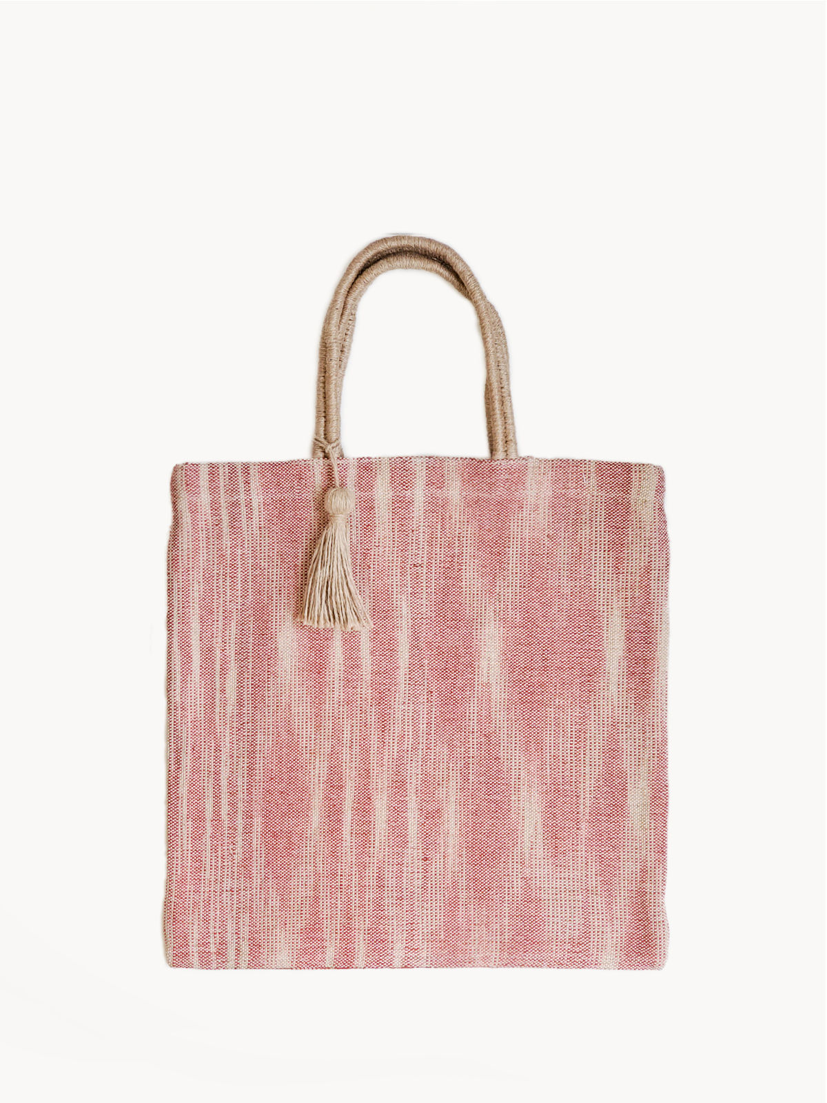 Nadi Jute Tote Bag in red, hand-loomed and naturally dyed, with sturdy handles and a spacious design
