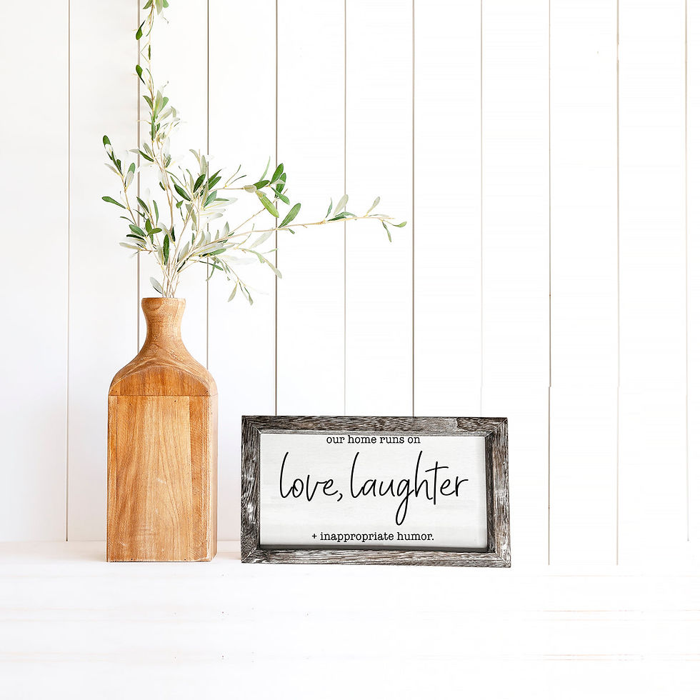 Thumbnail: A wooden sign with the words 'Love Laughter' in plain font.