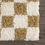 Thumbnail: "Atira area rug with a mustard yellow checkered pattern, modern and stylish home decor accent."