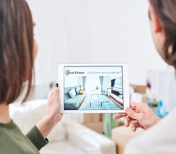 young-couple-holding-tablet-with-advertisement-of-real-estate-on-sale.jpg