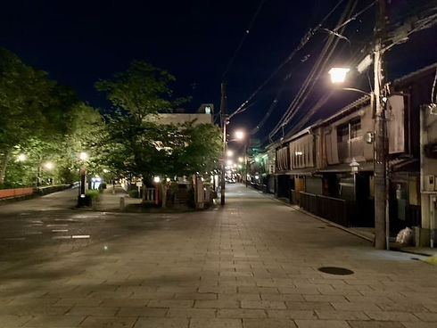 Shinbashi Street in Gion Kyoto at night with traditional buildings and lantern-lit atmosphere