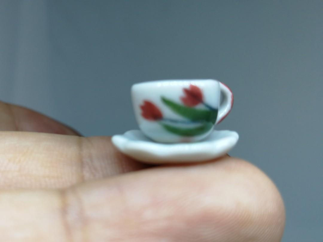 A coffee or teh in design cup with saucer