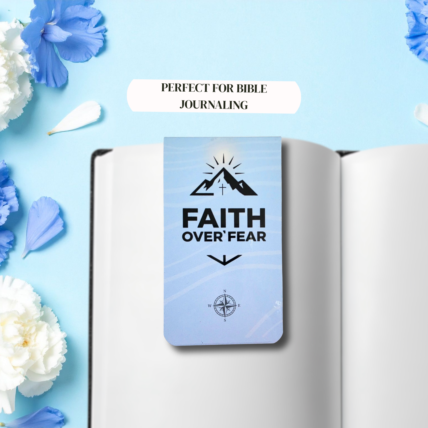 Magnetic bookmark used in Bible journaling open notebook