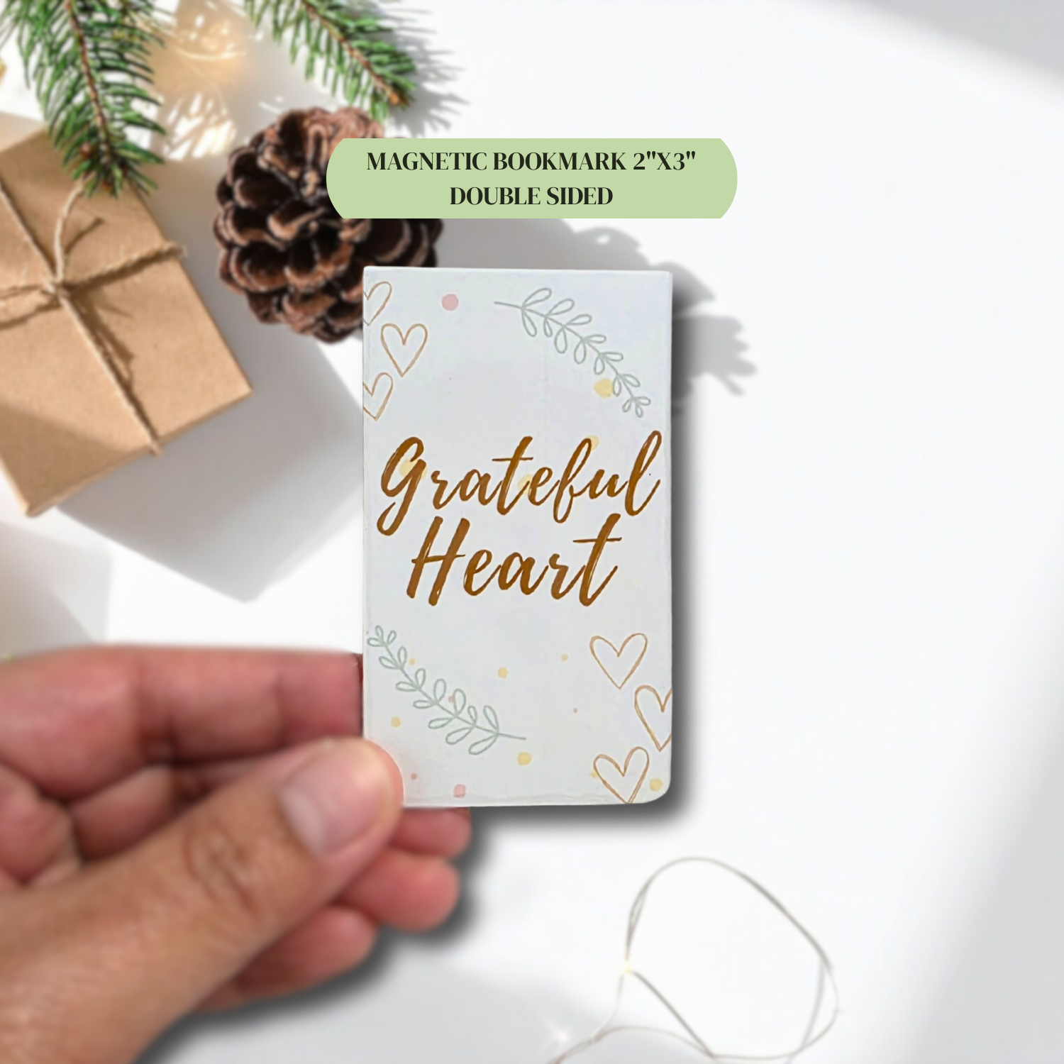 Christian magnetic bookmark reading “Grateful Heart” held in hand, pastel design.