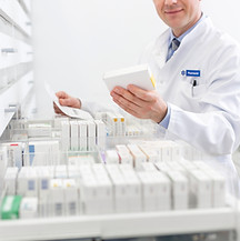Pharmacist organizing medications