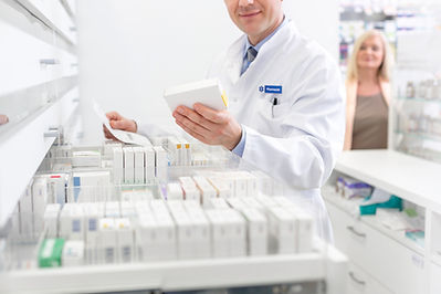 A Pharmaceutical Industry Professional Reviewing Product Labels for SPL & ACA6004 Compliance