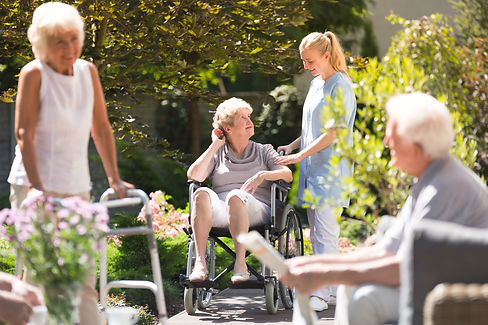 Senior woman in wheelchair spending time