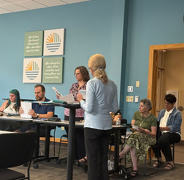 Board Chair, Bev Erickson, a woman with blonde hair speaks during an award social