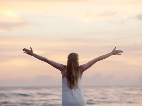A Woman Embracing Freedom and Confidence at the beach