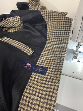 Handmade gilet being made on sewing machine
