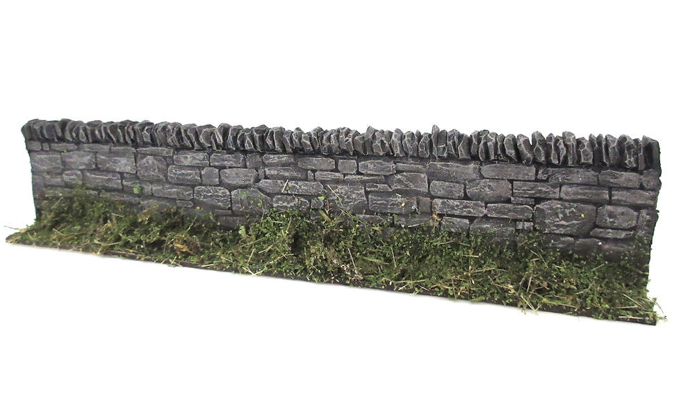 Slanted dry stone wall style capping.