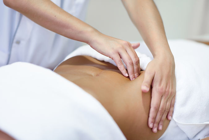 woman-receiving-belly-massage-spa-salon_edited.jpg