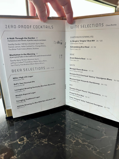 Open menu on table at Geo-82 at EPCOT at Walt Disney World