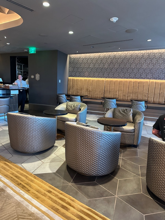 Comfy seating area at adults only bar Geo-82 at EPCOT