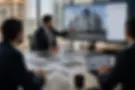 Developers reviewing commercial property project presentation in office meeting, real estate marketing visuals and investor presentation NYC