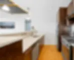 Staten Island home kitchen — clean interior with wood cabinetry and bright countertops