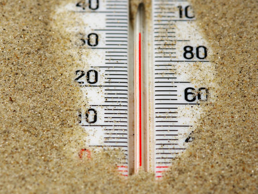 Thermometer unter Sand