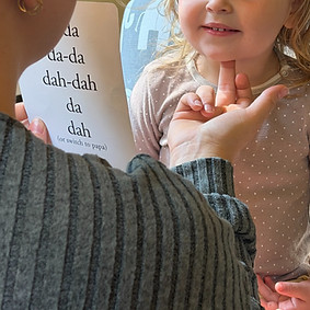 Speech pathologist working with child