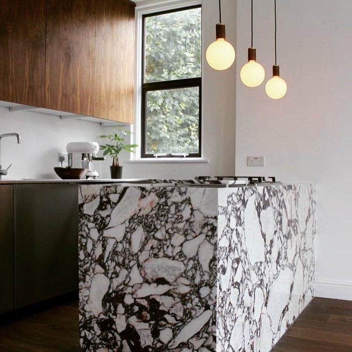 Marble with intricate brown veining for a unique and sophisticated kitchen.