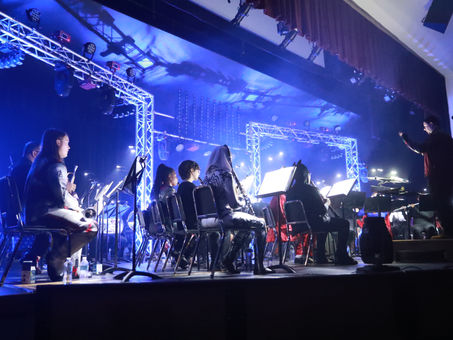 Baldwin High School Plays with Light and Sound During the 2022 "Marvel vs DC" Spring Concert 