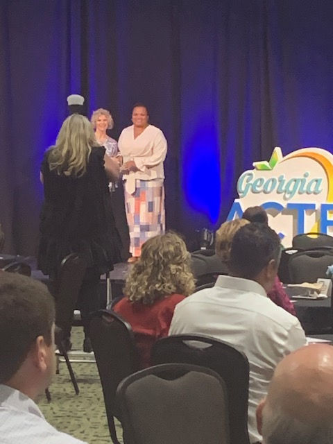 Dr. Jones accepts the award at the GCTAE Conference