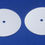 Thumbnail: two T A-04311 diaphragms for replacing ADI pump parts on a blue background
