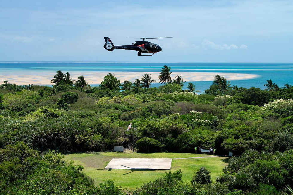 Chopper flying over island