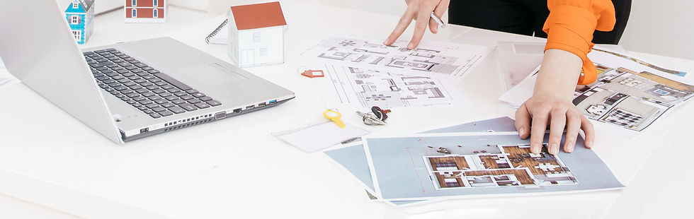 female-architecture-inspecting-blueprint-desk-office_edited.jpg