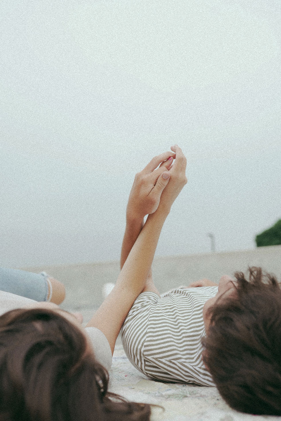 Couple holding hands