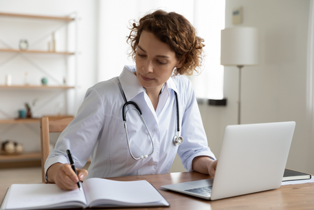 nurse working at desk