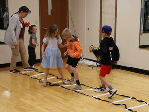 Children participate in games and physical activities at the Mark A. Chapman Wellness Center during Clay County Medical Center's Teddy Bear Clinic event.