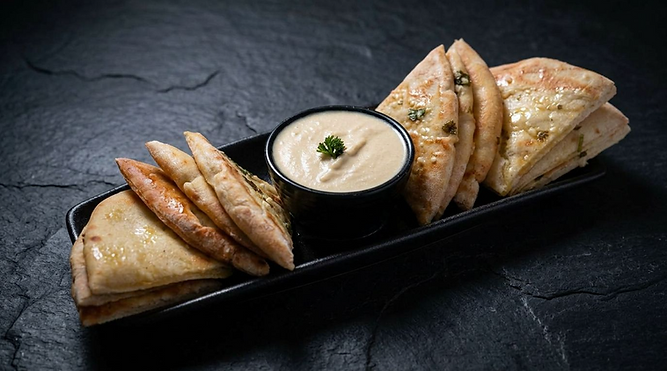 Garlic and pita black background.png