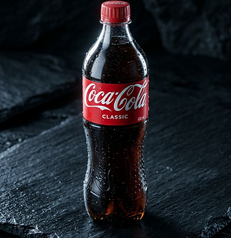 600 ml coca cola black background.png