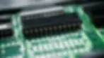 Close-up of through-hole components on a PCB