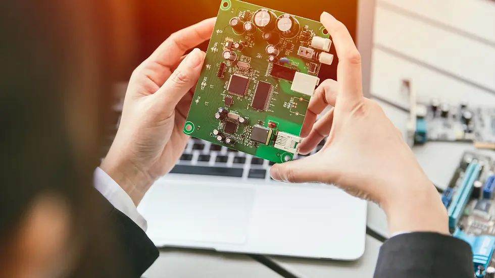 A2Z EMS Engineer inspecting PCB board