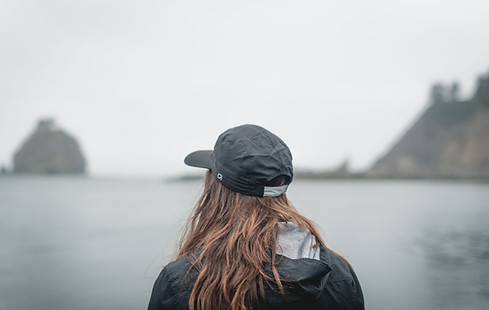 Woman Looking At Lake
